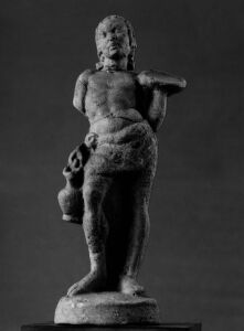 Hellenistic - Man holding a dish and an oinochoe - Paris Louvre